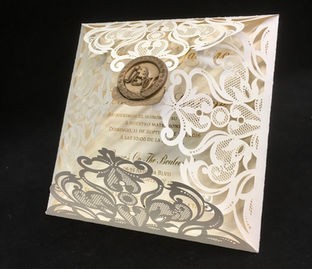 Laser cut · Wax seal · Vellum overlay